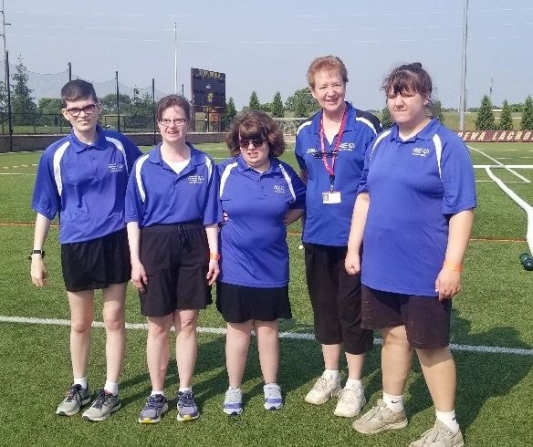 Team Huron Valley Special Olympics staff and volunteers on the field